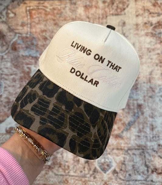 Living on that blue collar dollar! 💵 -Trucker Hat